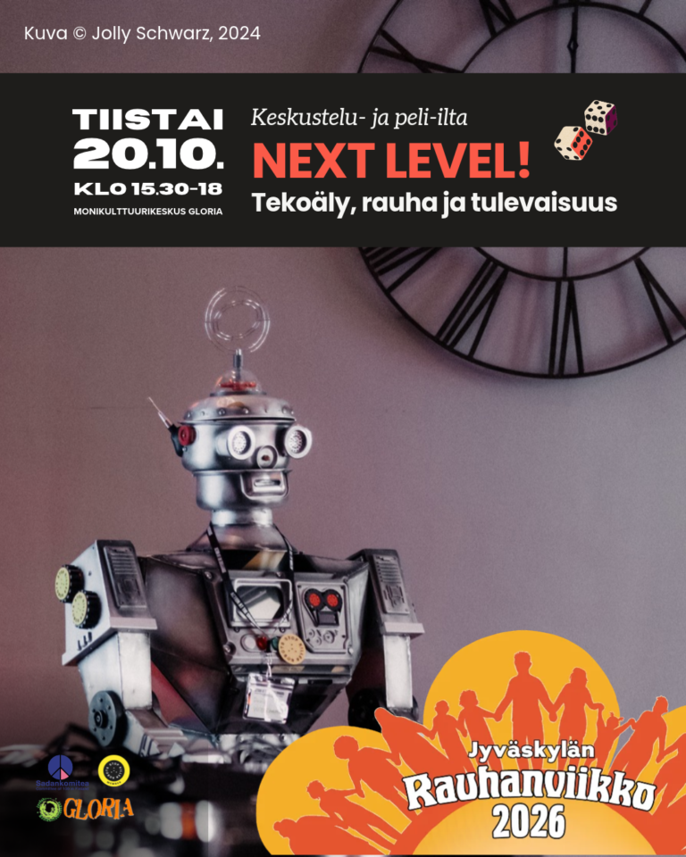 Tapahtumakuvassa esiintyy Stop Killer Robots -kampanjan ystävällinen robottimaskotti David Wreckham.